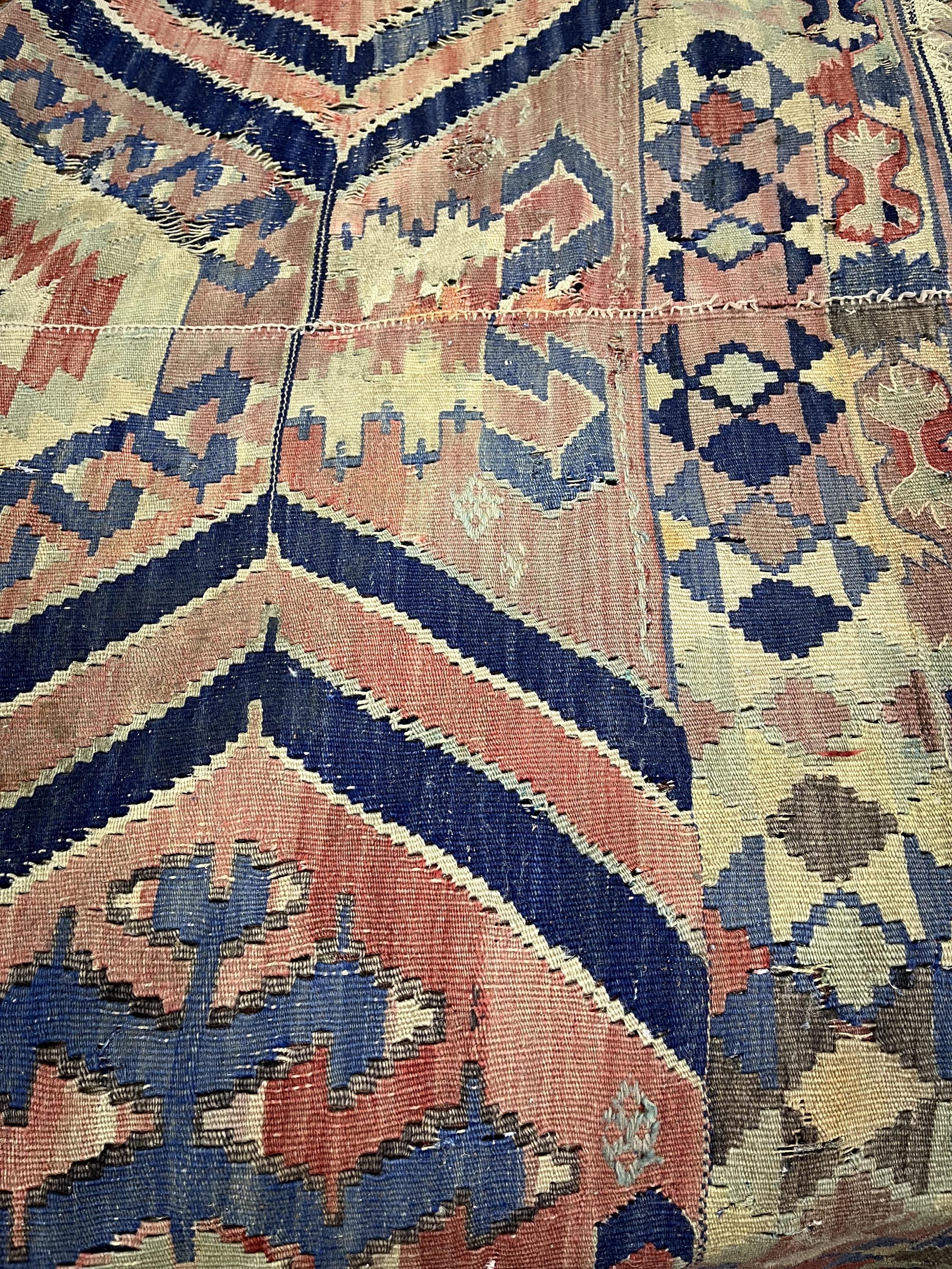 A Kilim polychrome flatweave carpet, 298 x 199cm